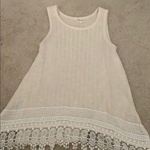 flowy tank top with design on bottom